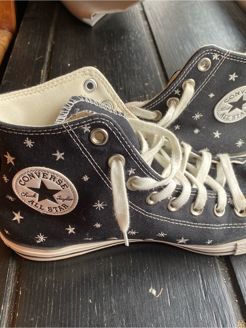 Converse womans High Top Sneakers in Black with White Stars